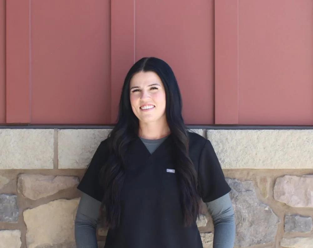 Portrait of Taylee, team member at Farr West Animal Hospital